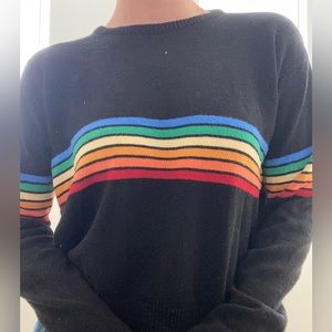 black and rainbow striped knit sweater